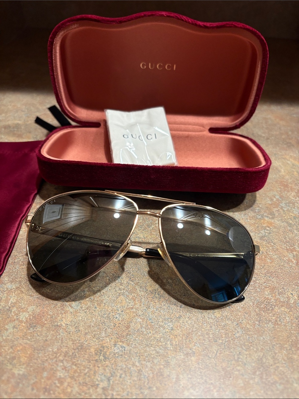 Gucci Men’s Gold Frame Sunglasses with Black Lenses
